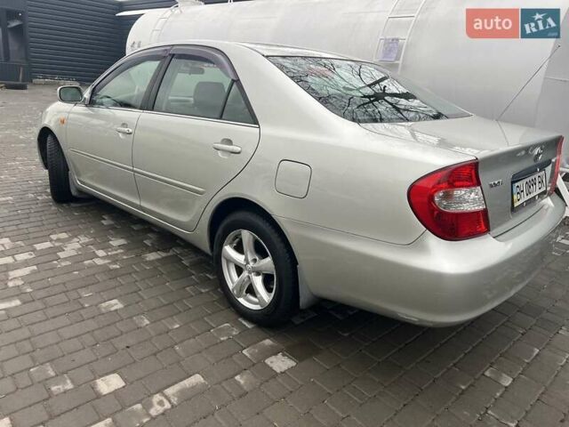 Сірий Тойота Камрі, об'ємом двигуна 2.4 л та пробігом 216 тис. км за 5999 $, фото 18 на Automoto.ua