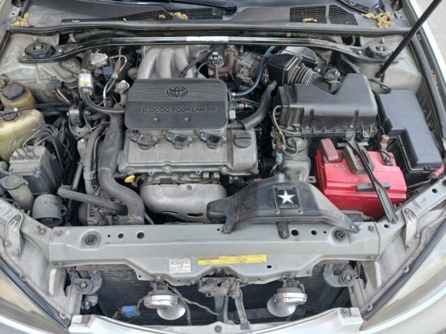 Сірий Тойота Камрі, об'ємом двигуна 3 л та пробігом 370 тис. км за 5600 $, фото 5 на Automoto.ua