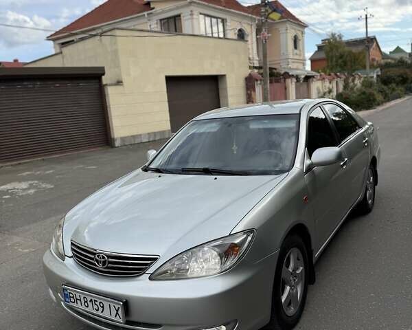 Сірий Тойота Камрі, об'ємом двигуна 3 л та пробігом 215 тис. км за 6800 $, фото 6 на Automoto.ua