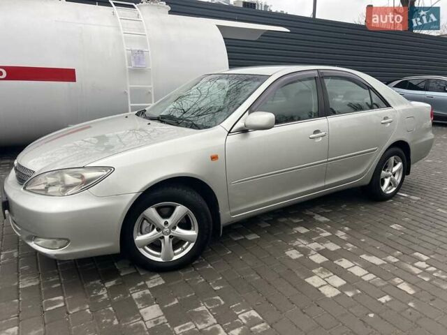 Сірий Тойота Камрі, об'ємом двигуна 2.4 л та пробігом 216 тис. км за 5999 $, фото 6 на Automoto.ua