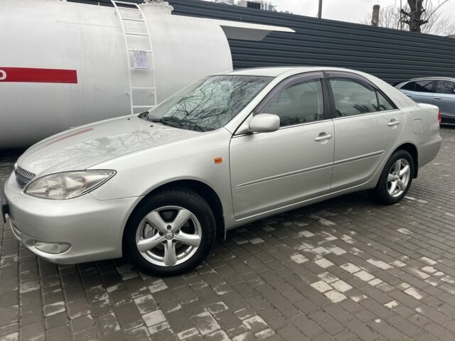 Сірий Тойота Камрі, об'ємом двигуна 2.4 л та пробігом 216 тис. км за 5999 $, фото 2 на Automoto.ua