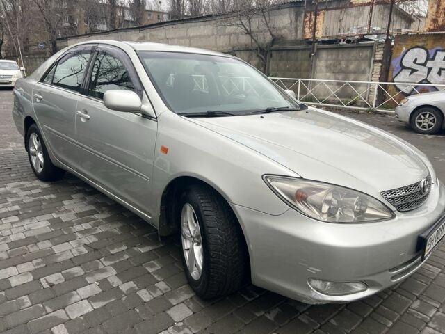 Сірий Тойота Камрі, об'ємом двигуна 2.4 л та пробігом 216 тис. км за 5999 $, фото 4 на Automoto.ua