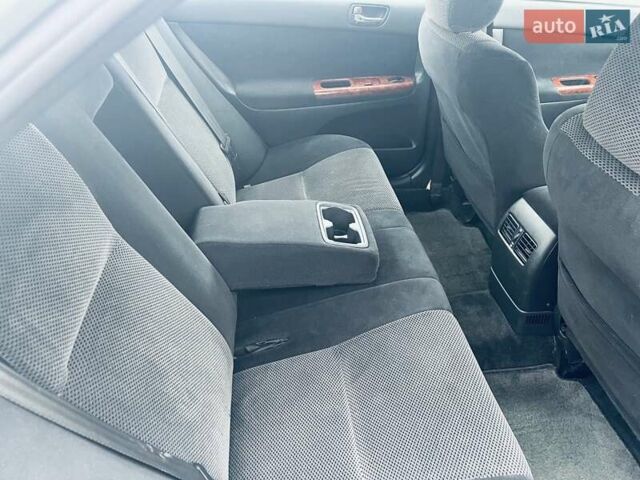 Сірий Тойота Камрі, об'ємом двигуна 2.4 л та пробігом 216 тис. км за 5999 $, фото 42 на Automoto.ua