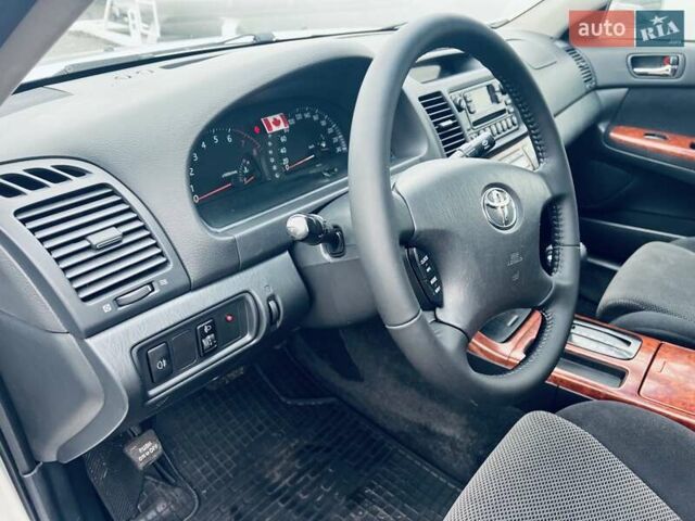 Сірий Тойота Камрі, об'ємом двигуна 2.4 л та пробігом 216 тис. км за 5999 $, фото 38 на Automoto.ua