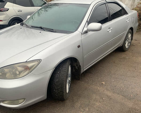 Сірий Тойота Камрі, об'ємом двигуна 2.4 л та пробігом 432 тис. км за 4600 $, фото 1 на Automoto.ua