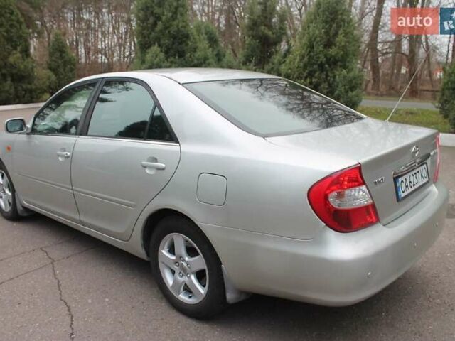 Серый Тойота Камри, объемом двигателя 2.4 л и пробегом 375 тыс. км за 5500 $, фото 6 на Automoto.ua