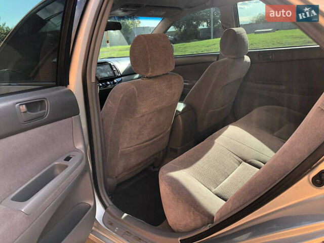 Сірий Тойота Камрі, об'ємом двигуна 2.36 л та пробігом 265 тис. км за 4800 $, фото 5 на Automoto.ua