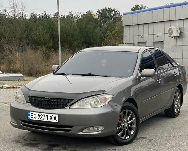 Сірий Тойота Камрі, об'ємом двигуна 3 л та пробігом 384 тис. км за 5500 $, фото 27 на Automoto.ua