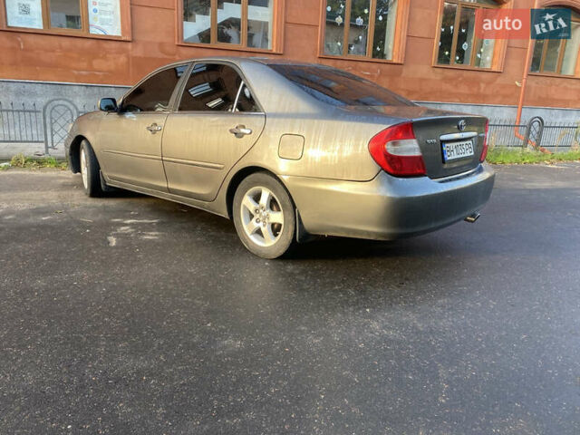 Серый Тойота Камри, объемом двигателя 2.36 л и пробегом 270 тыс. км за 5100 $, фото 1 на Automoto.ua