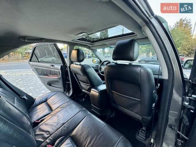 Серый Тойота Камри, объемом двигателя 2.4 л и пробегом 257 тыс. км за 5400 $, фото 13 на Automoto.ua