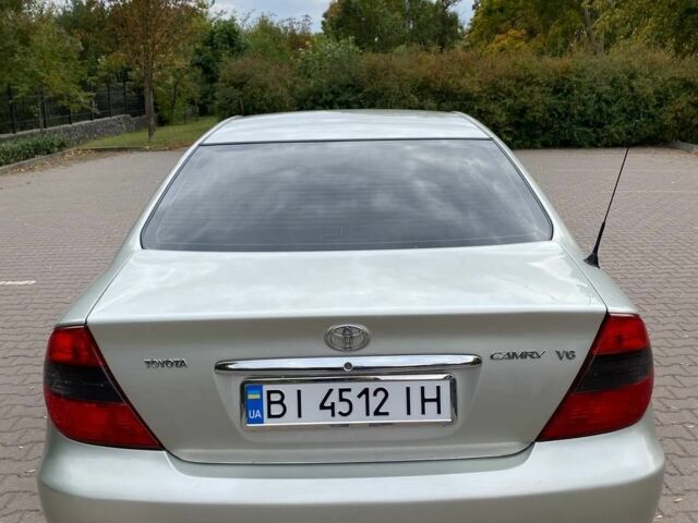 Серый Тойота Камри, объемом двигателя 3 л и пробегом 303 тыс. км за 4500 $, фото 2 на Automoto.ua