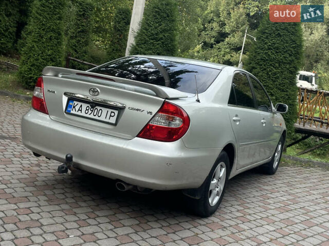 Серый Тойота Камри, объемом двигателя 3 л и пробегом 240 тыс. км за 6250 $, фото 15 на Automoto.ua