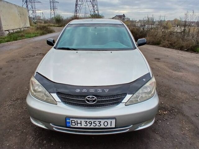 Серый Тойота Камри, объемом двигателя 2.4 л и пробегом 300 тыс. км за 4200 $, фото 1 на Automoto.ua