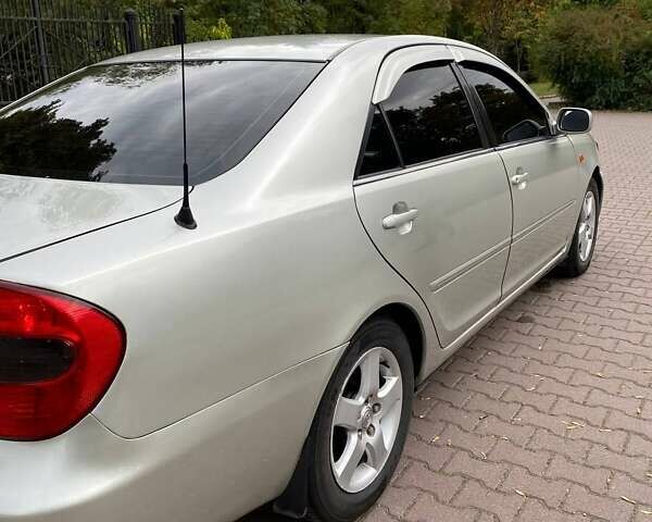 Серый Тойота Камри, объемом двигателя 3 л и пробегом 303 тыс. км за 4500 $, фото 14 на Automoto.ua