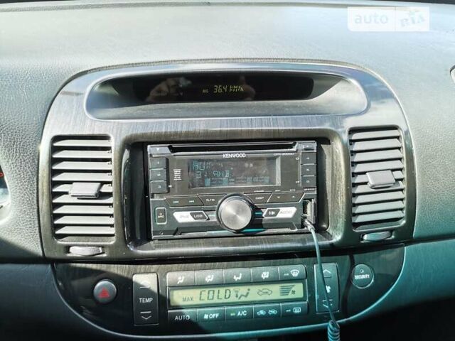 Серый Тойота Камри, объемом двигателя 3 л и пробегом 406 тыс. км за 5500 $, фото 16 на Automoto.ua