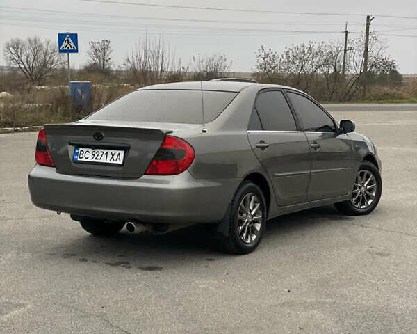 Сірий Тойота Камрі, об'ємом двигуна 3 л та пробігом 384 тис. км за 5500 $, фото 20 на Automoto.ua
