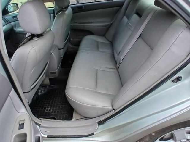 Серый Тойота Камри, объемом двигателя 2.4 л и пробегом 300 тыс. км за 4200 $, фото 7 на Automoto.ua