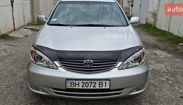 Серый Тойота Камри, объемом двигателя 2.36 л и пробегом 260 тыс. км за 6500 $, фото 9 на Automoto.ua