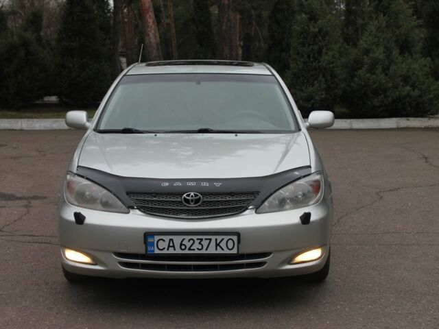 Серый Тойота Камри, объемом двигателя 2.4 л и пробегом 375 тыс. км за 5550 $, фото 10 на Automoto.ua