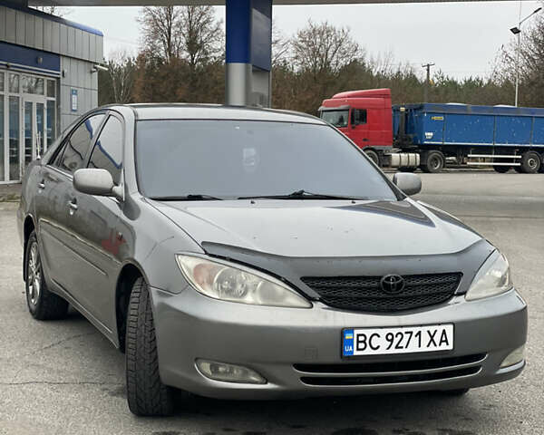 Сірий Тойота Камрі, об'ємом двигуна 3 л та пробігом 384 тис. км за 5500 $, фото 29 на Automoto.ua