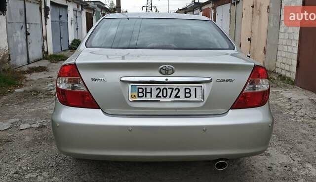 Серый Тойота Камри, объемом двигателя 2.36 л и пробегом 260 тыс. км за 6500 $, фото 7 на Automoto.ua