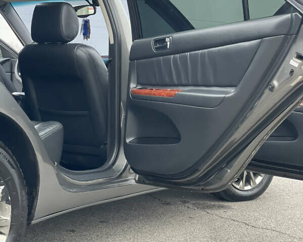 Сірий Тойота Камрі, об'ємом двигуна 3 л та пробігом 384 тис. км за 5500 $, фото 28 на Automoto.ua