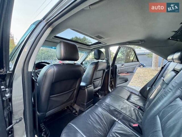 Серый Тойота Камри, объемом двигателя 2.4 л и пробегом 257 тыс. км за 5400 $, фото 17 на Automoto.ua