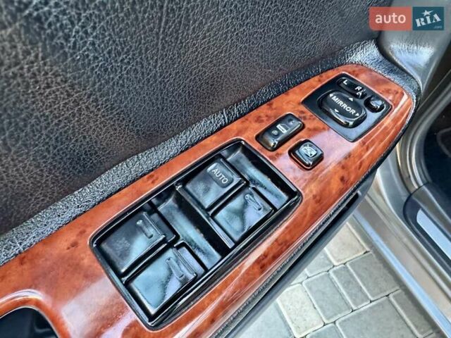 Серый Тойота Камри, объемом двигателя 2.4 л и пробегом 257 тыс. км за 5400 $, фото 75 на Automoto.ua