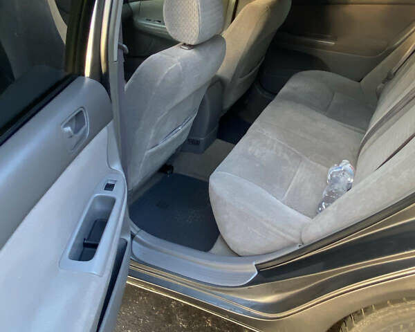 Серый Тойота Камри, объемом двигателя 2.36 л и пробегом 270 тыс. км за 5100 $, фото 7 на Automoto.ua