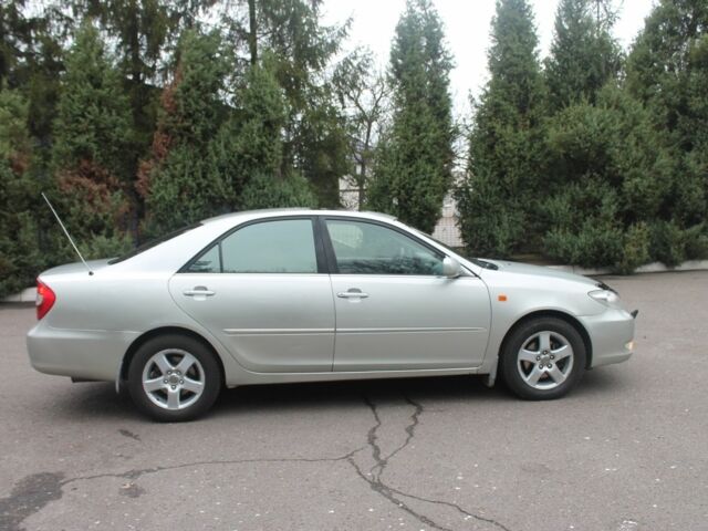 Серый Тойота Камри, объемом двигателя 2.4 л и пробегом 375 тыс. км за 5550 $, фото 2 на Automoto.ua