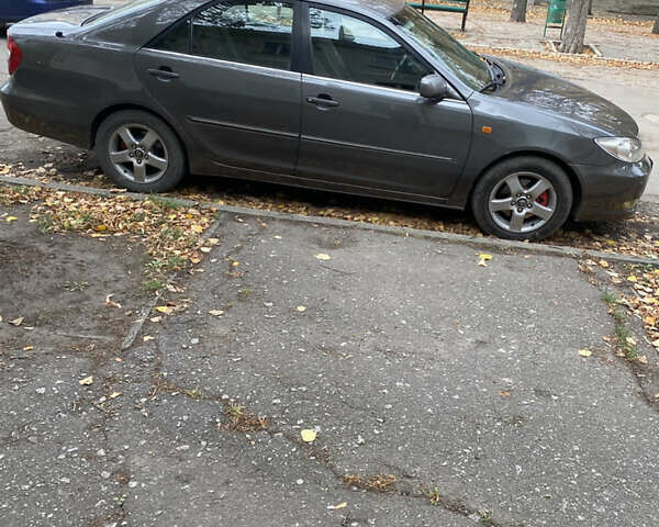 Сірий Тойота Камрі, об'ємом двигуна 2.4 л та пробігом 375 тис. км за 4800 $, фото 2 на Automoto.ua