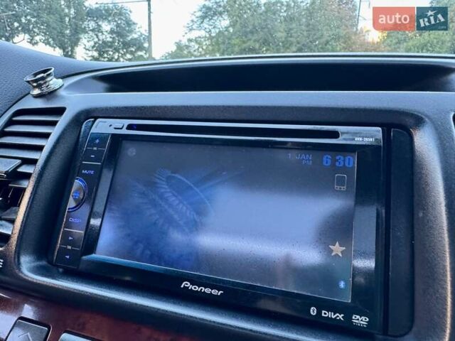 Серый Тойота Камри, объемом двигателя 2.4 л и пробегом 257 тыс. км за 5400 $, фото 25 на Automoto.ua