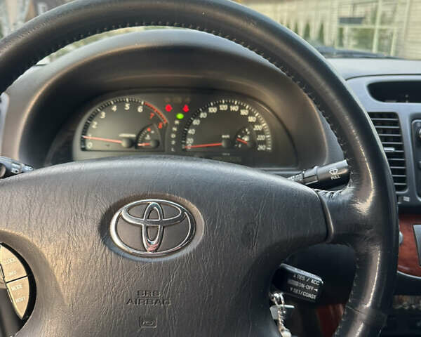 Серый Тойота Камри, объемом двигателя 3 л и пробегом 205 тыс. км за 4500 $, фото 4 на Automoto.ua