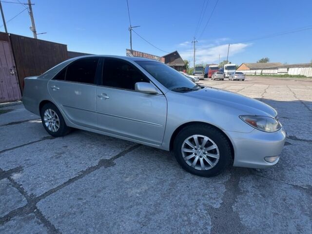 Серый Тойота Камри, объемом двигателя 3 л и пробегом 322 тыс. км за 4500 $, фото 1 на Automoto.ua