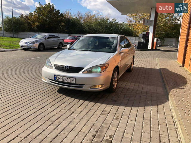 Сірий Тойота Камрі, об'ємом двигуна 2.36 л та пробігом 265 тис. км за 4800 $, фото 1 на Automoto.ua