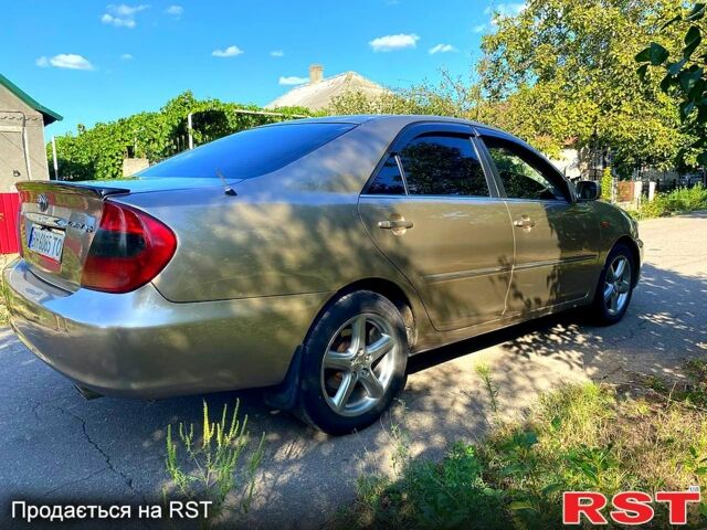 Сірий Тойота Камрі, об'ємом двигуна 3 л та пробігом 390 тис. км за 6000 $, фото 3 на Automoto.ua