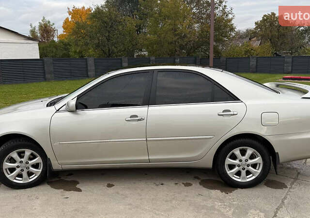 Серый Тойота Камри, объемом двигателя 2.4 л и пробегом 400 тыс. км за 5000 $, фото 5 на Automoto.ua