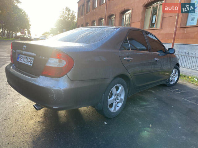 Серый Тойота Камри, объемом двигателя 2.36 л и пробегом 270 тыс. км за 5100 $, фото 2 на Automoto.ua