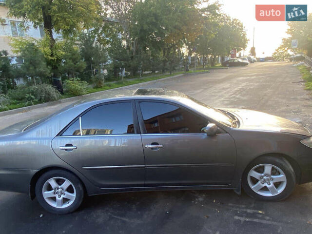 Серый Тойота Камри, объемом двигателя 2.36 л и пробегом 270 тыс. км за 5100 $, фото 4 на Automoto.ua