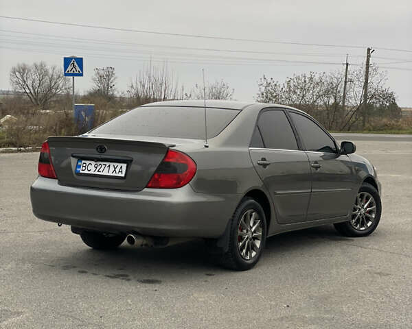 Сірий Тойота Камрі, об'ємом двигуна 3 л та пробігом 384 тис. км за 5500 $, фото 19 на Automoto.ua