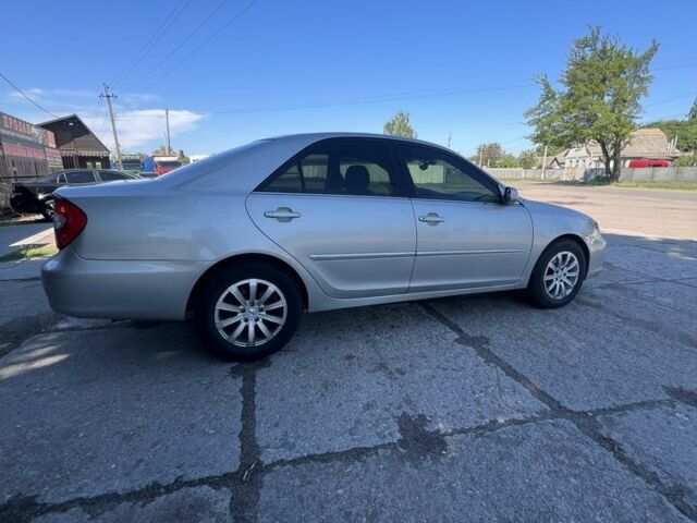 Серый Тойота Камри, объемом двигателя 3 л и пробегом 322 тыс. км за 4500 $, фото 2 на Automoto.ua