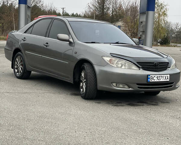 Сірий Тойота Камрі, об'ємом двигуна 3 л та пробігом 384 тис. км за 5500 $, фото 26 на Automoto.ua