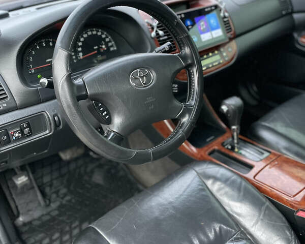 Сірий Тойота Камрі, об'ємом двигуна 3 л та пробігом 384 тис. км за 5500 $, фото 41 на Automoto.ua