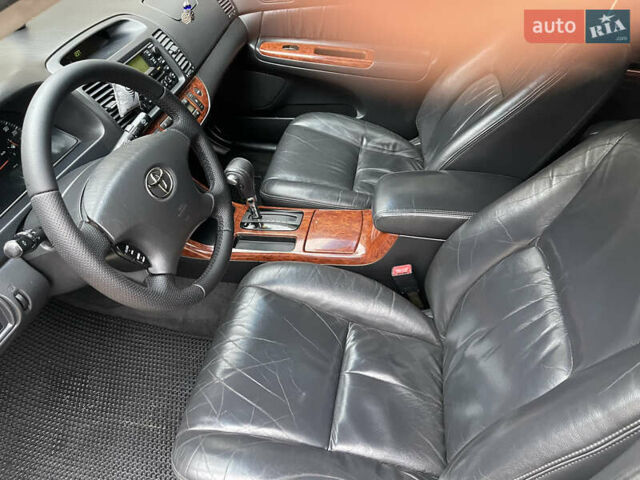 Серый Тойота Камри, объемом двигателя 3 л и пробегом 229 тыс. км за 7000 $, фото 7 на Automoto.ua