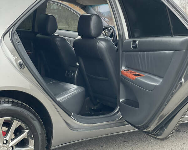 Сірий Тойота Камрі, об'ємом двигуна 3 л та пробігом 384 тис. км за 5500 $, фото 34 на Automoto.ua