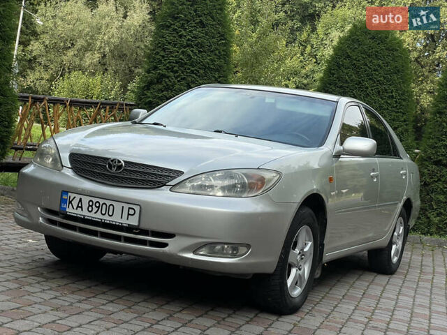 Серый Тойота Камри, объемом двигателя 3 л и пробегом 240 тыс. км за 6250 $, фото 2 на Automoto.ua