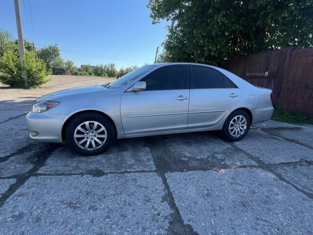 Серый Тойота Камри, объемом двигателя 3 л и пробегом 322 тыс. км за 4500 $, фото 6 на Automoto.ua