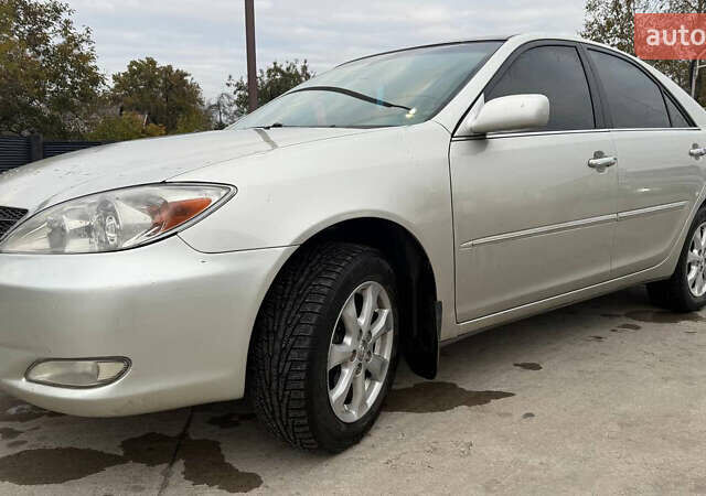 Серый Тойота Камри, объемом двигателя 2.4 л и пробегом 400 тыс. км за 5000 $, фото 2 на Automoto.ua