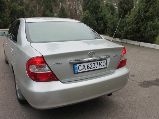 Серый Тойота Камри, объемом двигателя 2.4 л и пробегом 375 тыс. км за 5550 $, фото 5 на Automoto.ua
