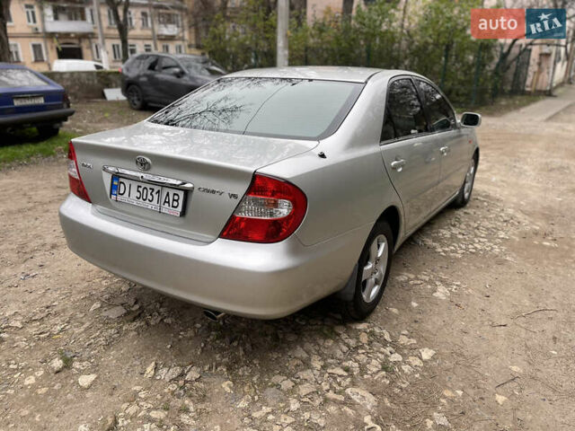 Серый Тойота Камри, объемом двигателя 3 л и пробегом 229 тыс. км за 7000 $, фото 3 на Automoto.ua